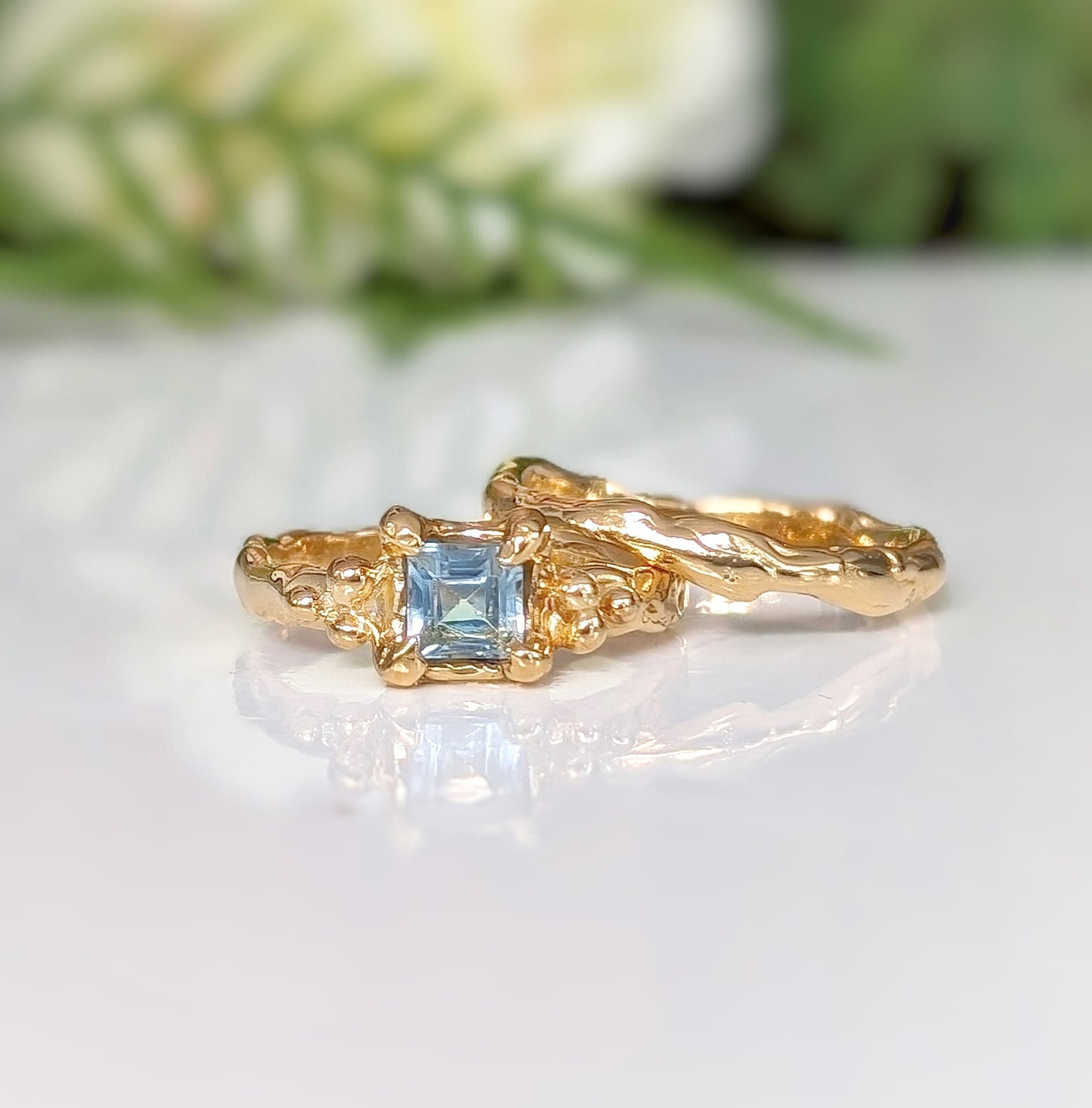 Set of  wedding rings - Blue Topaz engagement ring and textured wedding band - both in Molten 14k Gold 