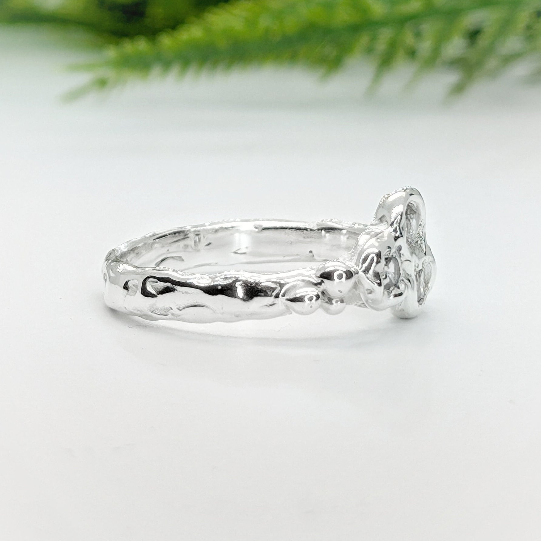 Cluster of 3 Cubic Zirconias set on a Molten Silver textured band