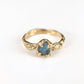 Raw Montana Sapphire Molten Gold engagement ring
