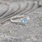 Trilliant shape Aquamarine set by prongs in organic Solid Sterling Silver setting