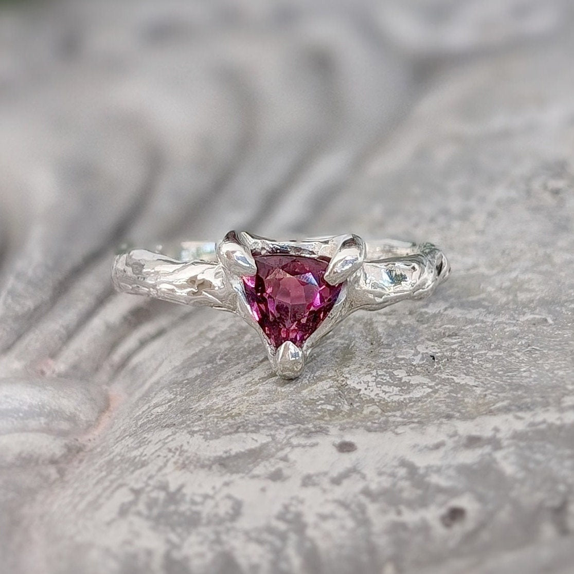 Trilliant shape Rubellite Tourmaline set by prongs on a textured Solid Sterling Silver band