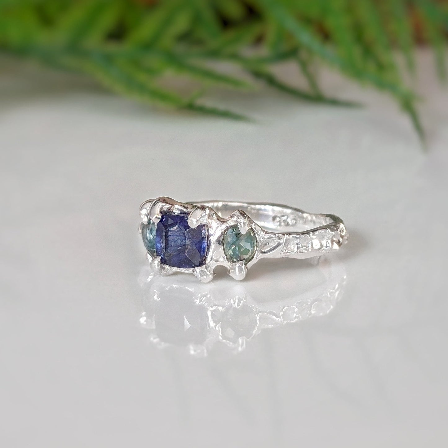 Blue Sapphire and Tourmaline ring in textured molten Silver setting