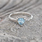 Trilliant shape Aquamarine set by prongs in organic Solid Sterling Silver setting