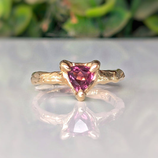 Trilliant shape Rubellite Tourmaline set by prongs on a textured Solid 14k Gold band